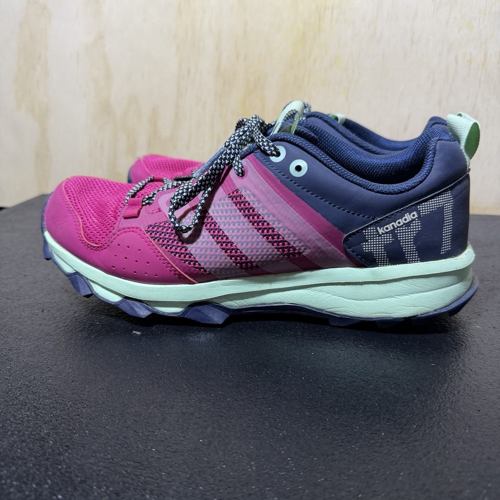 Adidas Kanadia TR7 trail‎ running shoes in pink, purple, and teal.